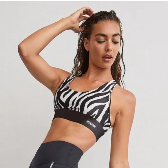 P.E. NATION Rematch Zebra Sports Bra and Workout Leggings SET REVOLVE Yoga - Picture 5 of 10